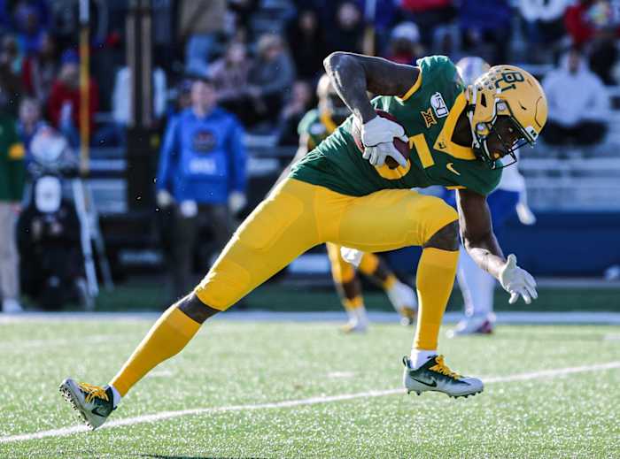 Nov 30, 2019; Lawrence, KS, USA; Baylor Bears wide receiver Denzel Mims (5) catches a pass against the Kansas Jayhawks during the first half at David Booth Kansas Memorial Stadium.